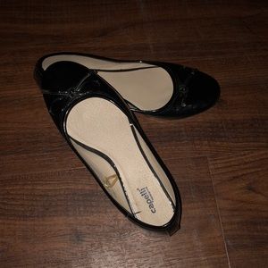 All black slip on flats